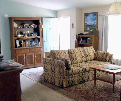 Large living room with built-in entertainment center & storage